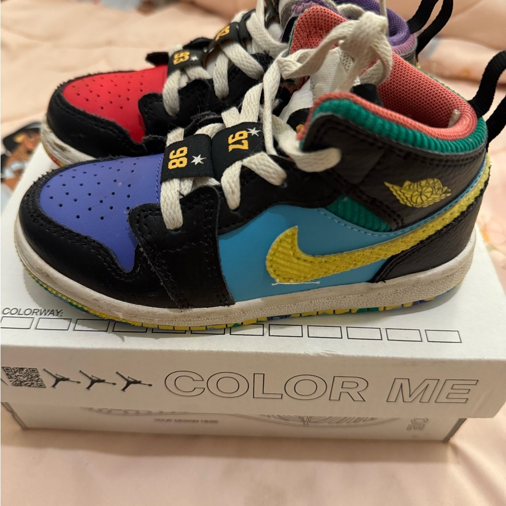 Jordan Kids Sneakers in Black, Red, Blue, and Yellow